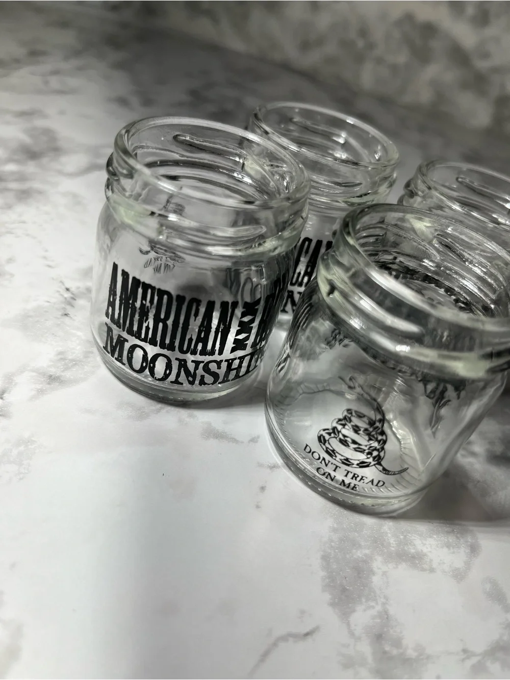 Set of 4 Clear Glass Shot Jars with Black Logo